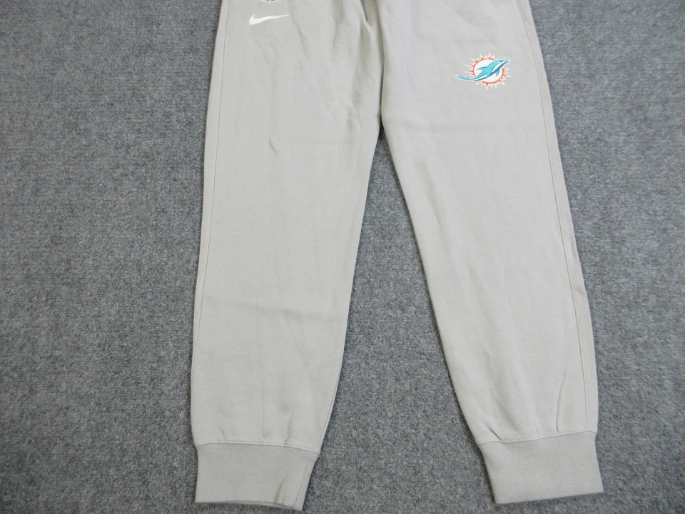 Pantalones deportivos Nike de fútbol americano emitidos por el equipo gris grande de los Miami Dolphins para hombre Foto 2 de 4