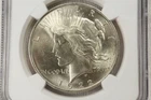NobleSpirit 1922 Silver Peace Dollar Bj & LC Villalpando NGC MS 62