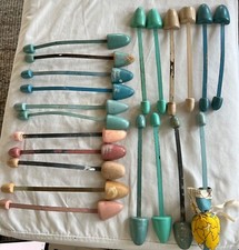 Vintage painted shoe stretchers in metal and wood.