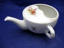 ANTIQUE INVALID FEEDER WITH ORANGE AND YELLOW FLOWERS 