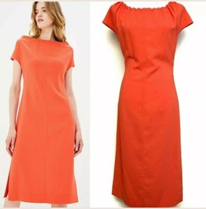 orange ruched midi dress