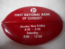QUIKOIN Squeeze Coin Purse Red Rubber 1ST FIRST NATIONAL BANK OF CLOQUET 3"