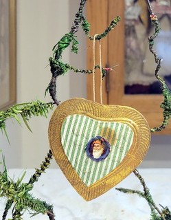 Gold Heart with Busts of Santa. 1880s Flat Dresden German Paper Ornament.