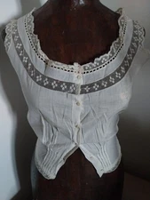 Lovely corset cover, with lace, in-between, ribbon pass, front pleats. 