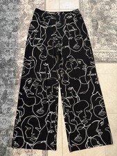 Joseph Ribkoff Classic Palazzo Pants - Black with face print- Size 10