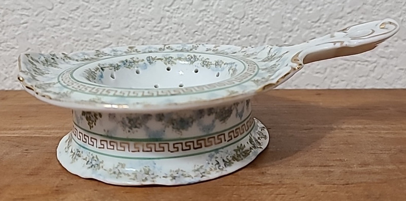 TEA STRAINER  MADE IN AUSTRIA   FLORAL PATTERN