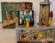 NOMURA JAPAN BATTERY OPERATED TIN TWO STAGE ROCKET LAUNCHER SPACE PLANET JUPITER