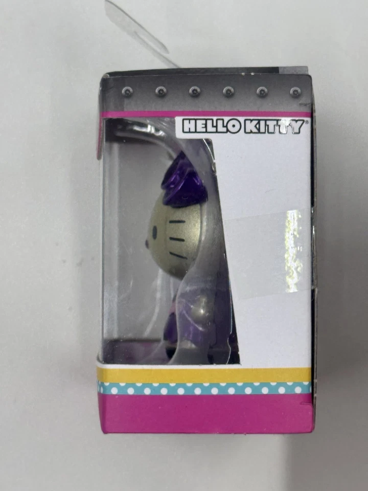 Sanrio S3 MetalFigs Dorado Hello Kitty Púrpura Vestido 2" Mini Figura Jada Toys Nuevo Foto 4 de 4