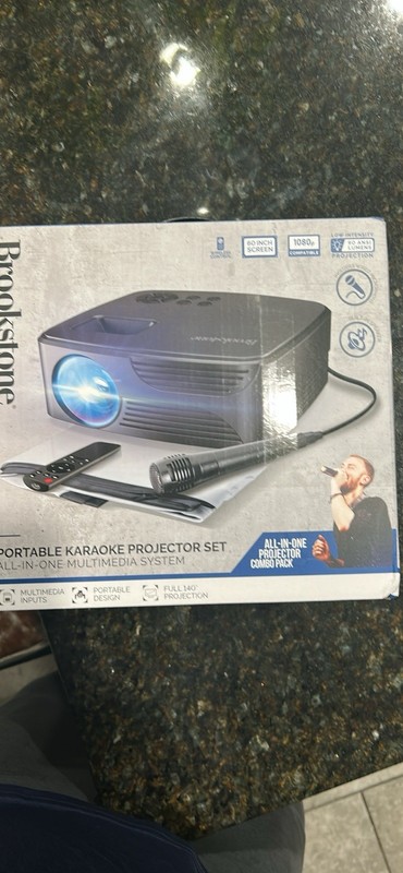 Brookstone Portable KARAOKE Projector Set Multimedia System Microphone Speaker