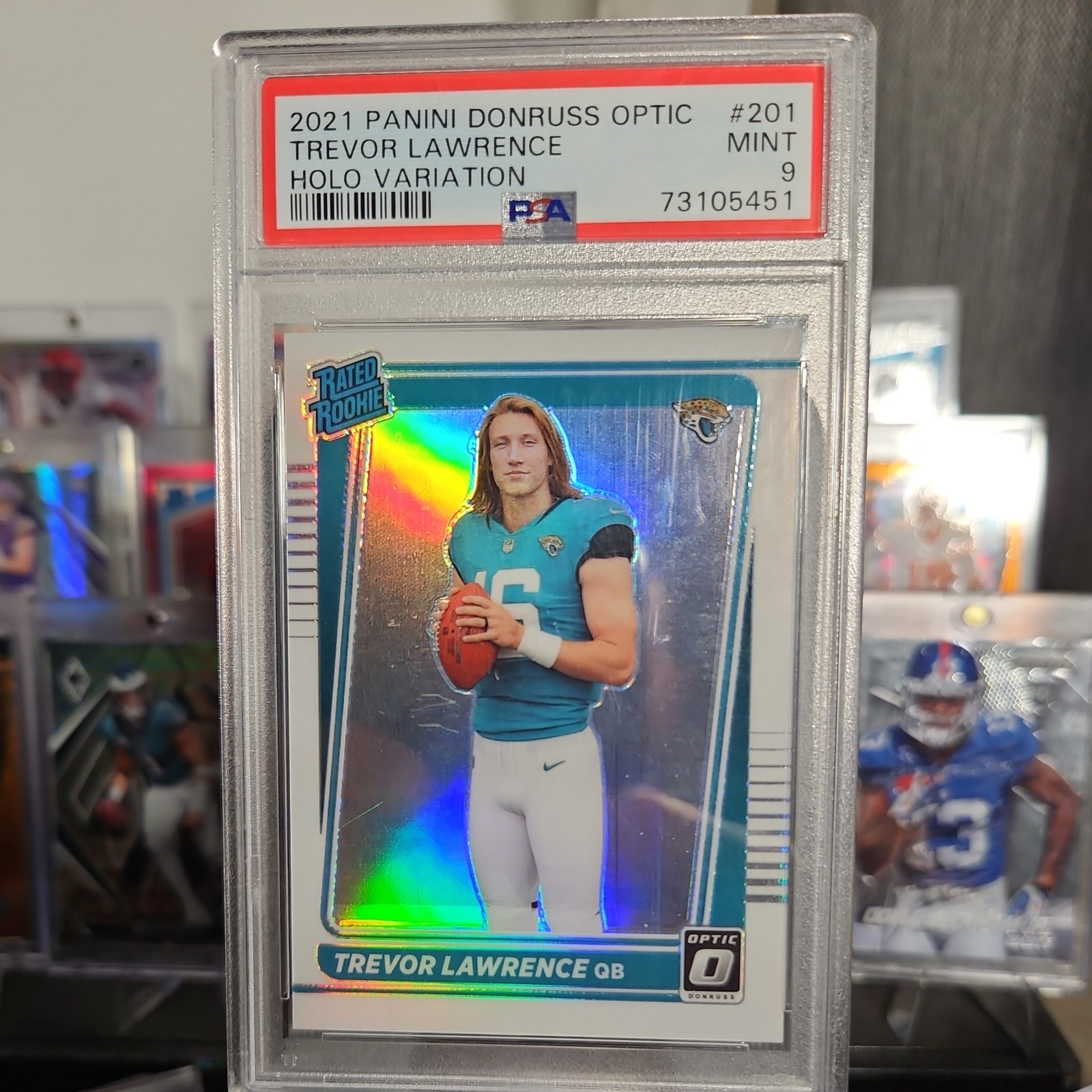 2021 Panini Optic - Rated Rookie Trevor Lawrence #201 Holo Variation PSA 9