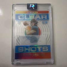 2021 Panini Illusions Trevor Lawrence Clear Shots Blue Rookie Auto #1/15