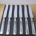 Set of 6 Vintage 'Mc G. C. Co STAINLESS'  dinner knives