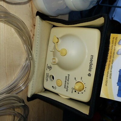 medela breast pump w 2 sets of accessories & metro bag