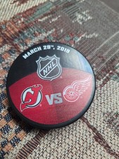New Jersey Devils Vs Detroit Red Wings Matchup Puck. Jake Chelios NHL Debut