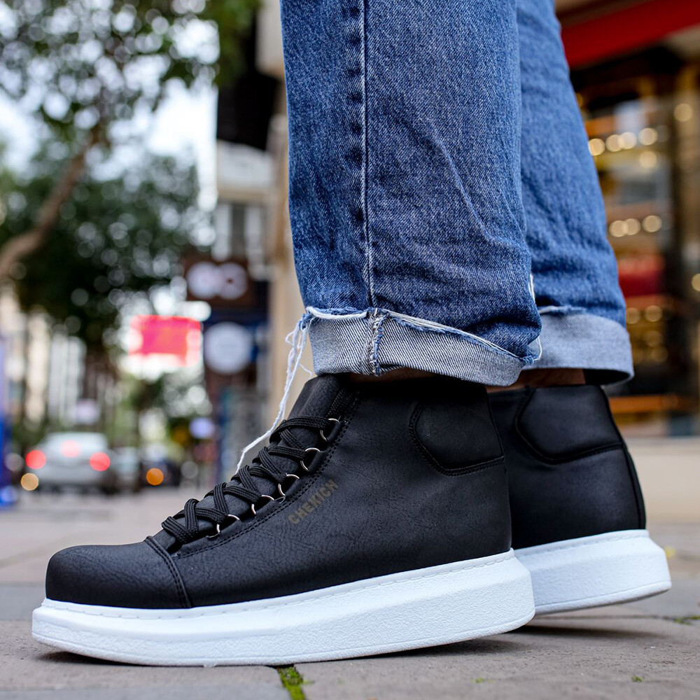 Shop black boots with white soles Shop