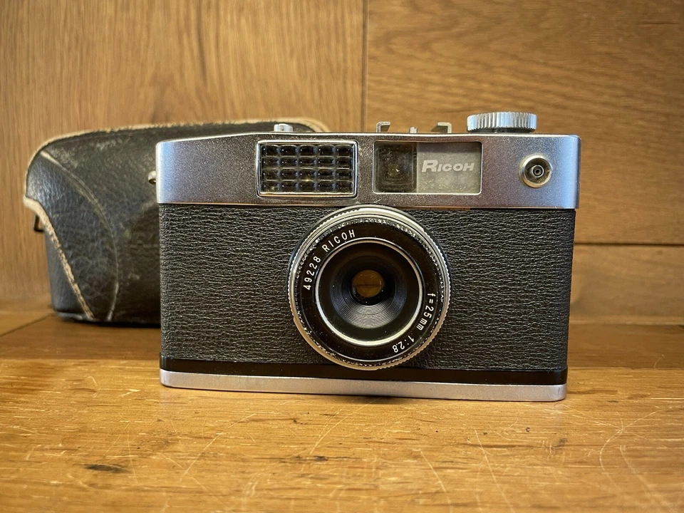 *Funcionamiento con medidor: lente TOMIOKA: excelente+5* Cámara fotográfica Ricoh Caddy de medio marco de JPN Foto 2 de 4