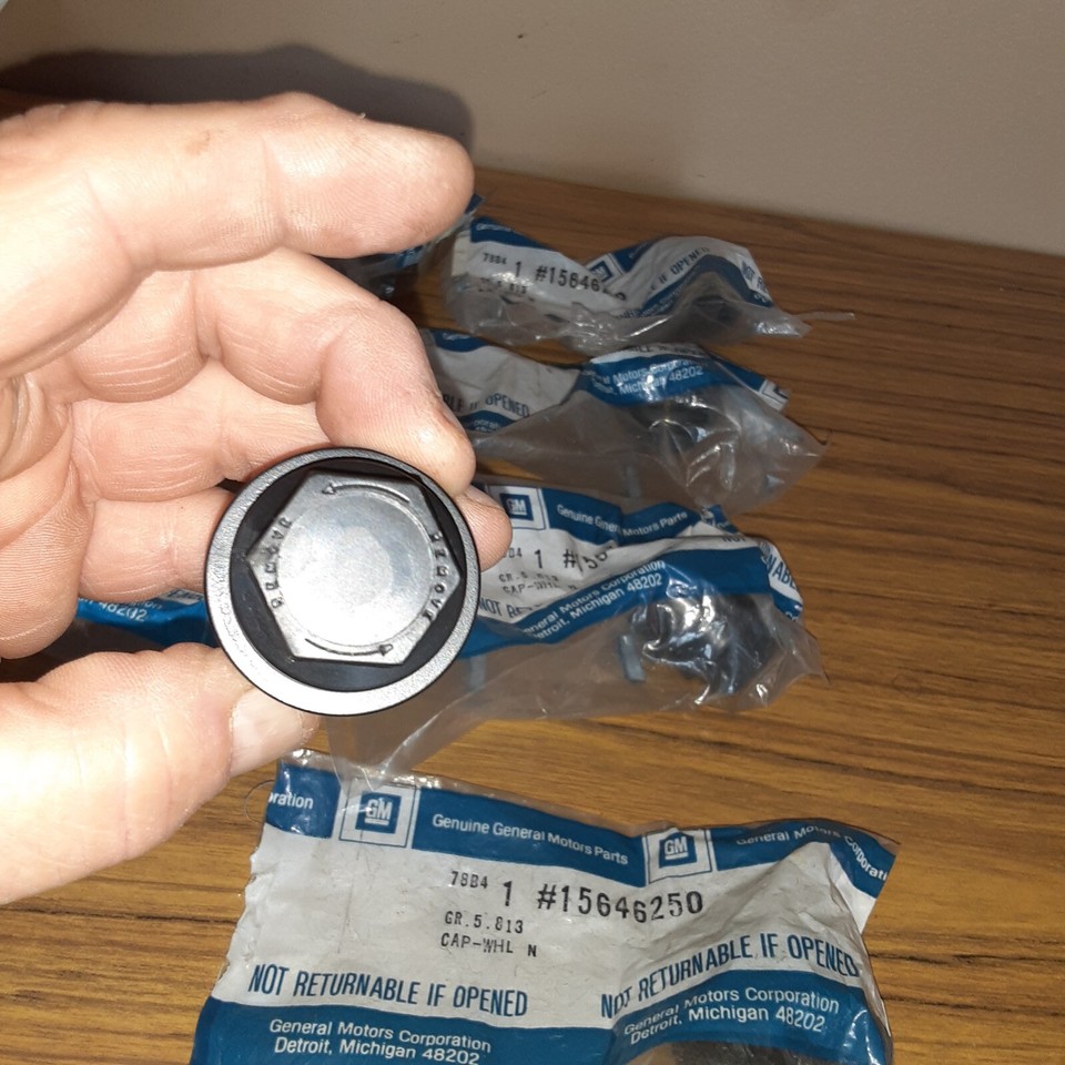 (9) NOS GM Wheel Lug Nut Insert Cover Caps GMC C1500 K1500 1500 Sierra