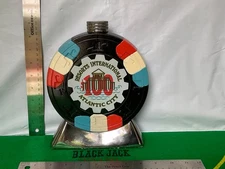 $100—RESORTS INTERNATIONAL—ATLANTIC CITY NEW JERSEY CASINO CHIP WHISKEY DECANTER