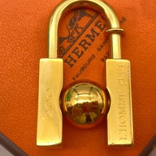 HERMES Cadena Lock Gold 2001 L HOMME PEUT EMBELLIR LA TERRE Charm 23.3g