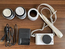 Nikon 1 J1 White Double Zoom Kit with Strap and Lens Hood