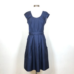 navy dress with pleated skirt