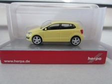 HERPA SPECIAL VW POLO 4 DOOR in YELLOW - model is PLASTIC - HO or 1:87 scale