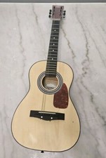 First Act FG-134 Acoustic Guitar, 3/4. It does work it just needs strings