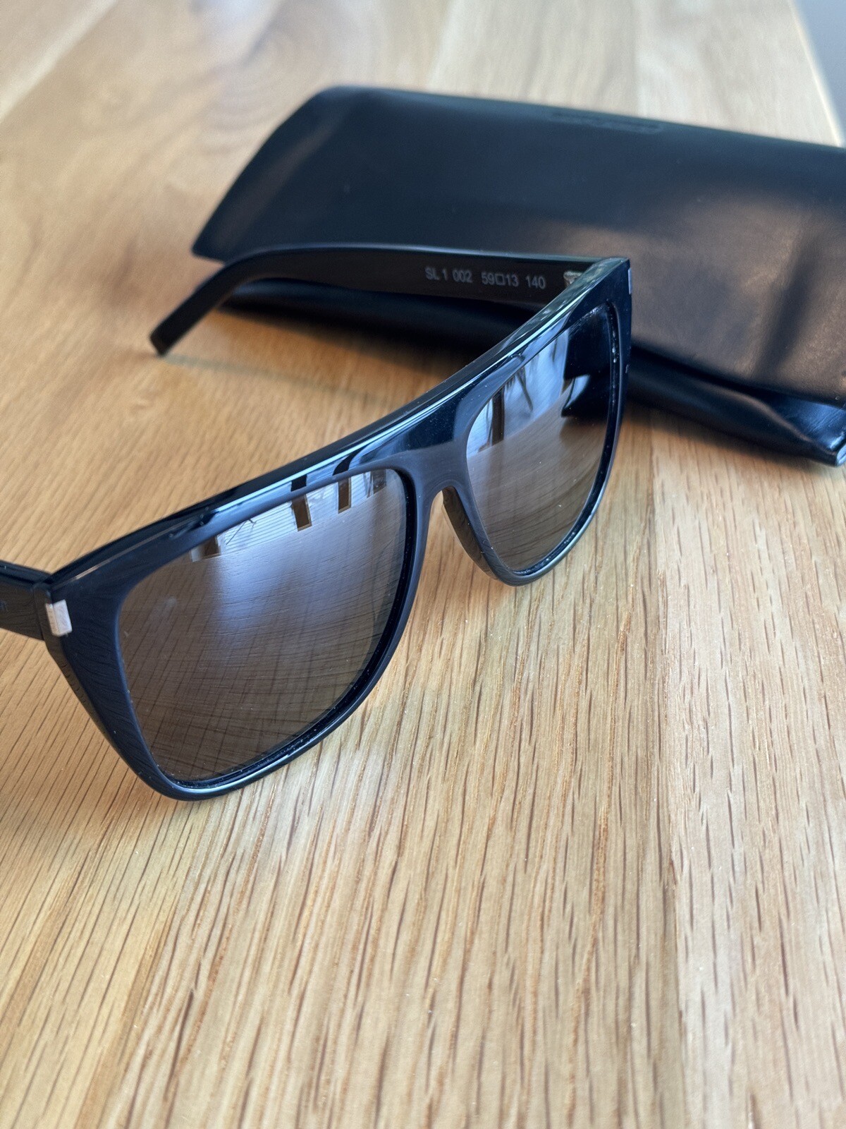 Occhiali da sole neri Saint Laurent Paris SL1 002 donna unisex classico chic