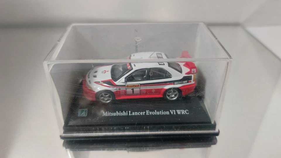 Hongwell 1:72 Mitsubishi Lancer Evolution VI WRC quasi nuovo nella scatola - Immagine 2 di 3