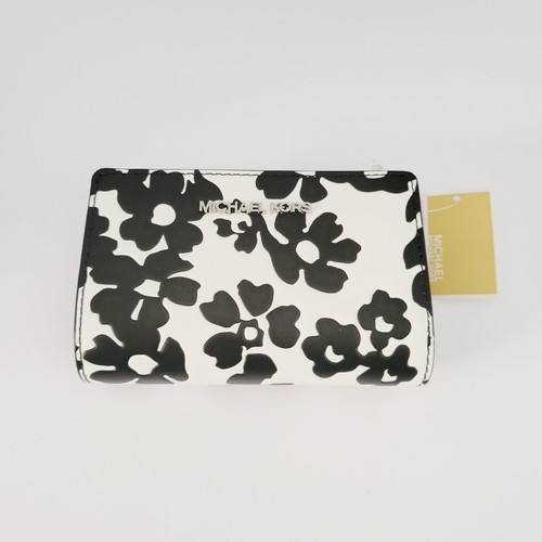 Portafoglio Michael Kors Jet Set da viaggio medio bifold zip portamonete nero in rilievo