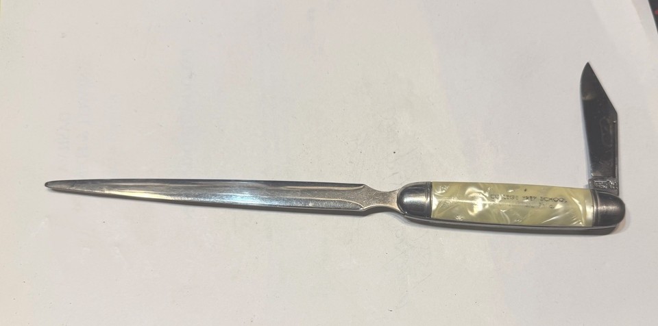 A rare celluloid combo desk piece from Imperial Providence RI — letter opener meets paper knife in a material (celluloid) almost nobody makes anymore.