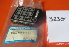 Original Mazda 323 (BG) lid for fuse box, cover, fuses,