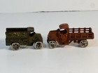 LOT OF 2: ATQ CAST IRON HUBLEY TOY TRUCKS (MACK STAKE/BELL TELEPHONE)