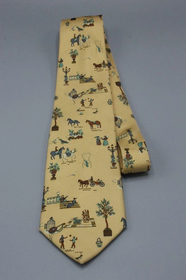 Corbata SALVATORE FERRAGAMO. Marrón claro con pájaros ecuestres malabaristas época victoriana Foto 2 de 4