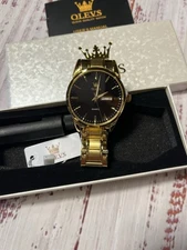 Olevs Men’s Gold Watch With Black Face. Style 6898 New In Box. Never Worn.