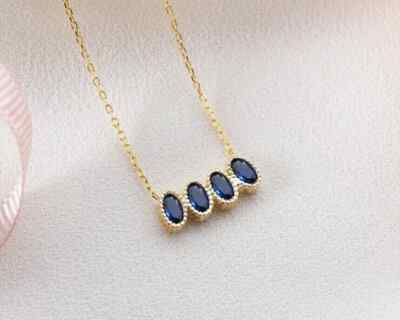 Four Stone Charm Pendant Necklace Oval Simulated Sapphire 14K Yellow Gold Finish