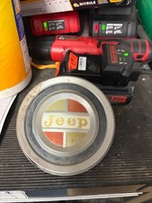 Jeepster Commando Grill Badge