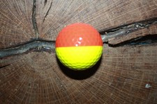 VINTAGE ORANGE AND YELLOW PING PROMOTIONAL GOLF BALL