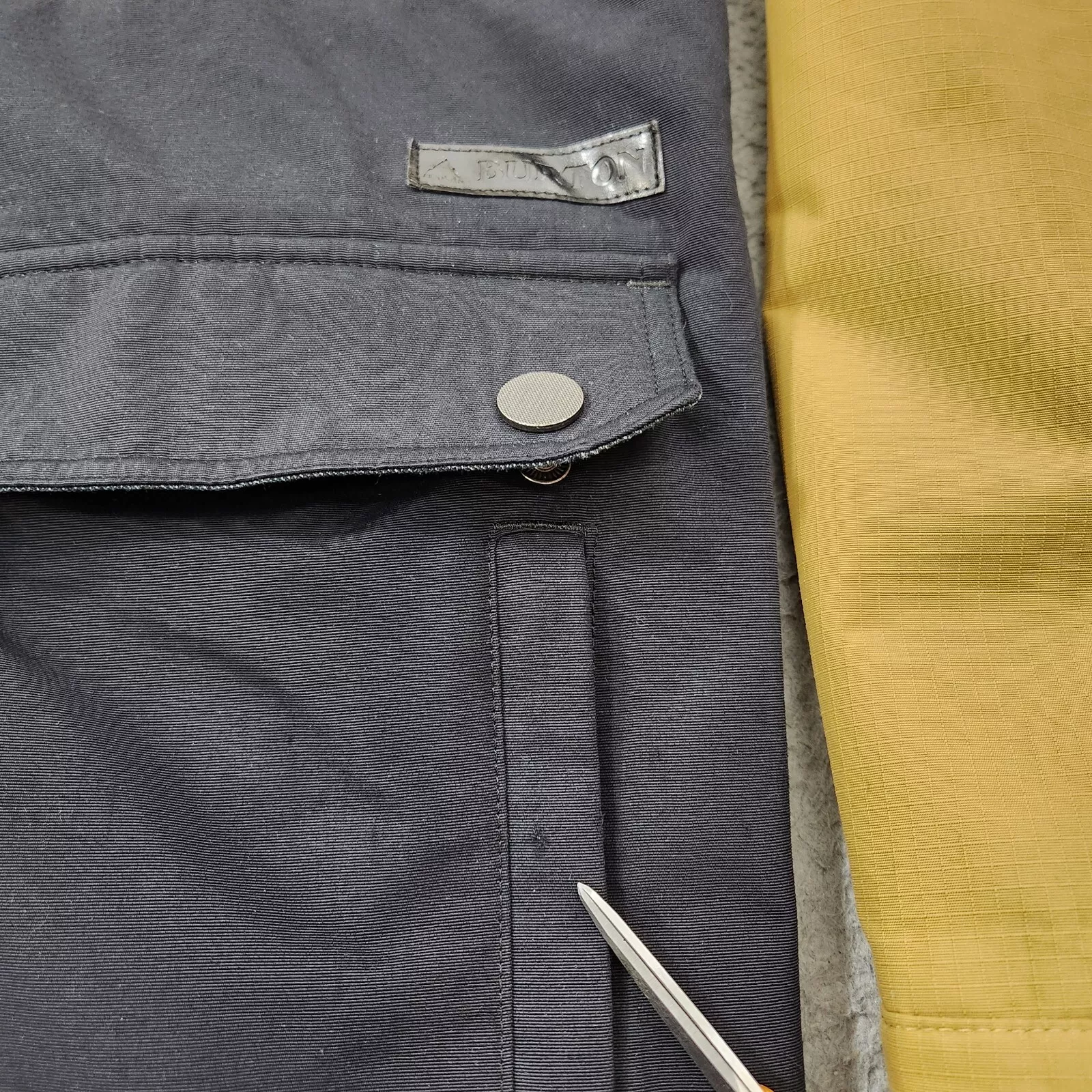 burton frontier dryride ski hood flaws jacket
