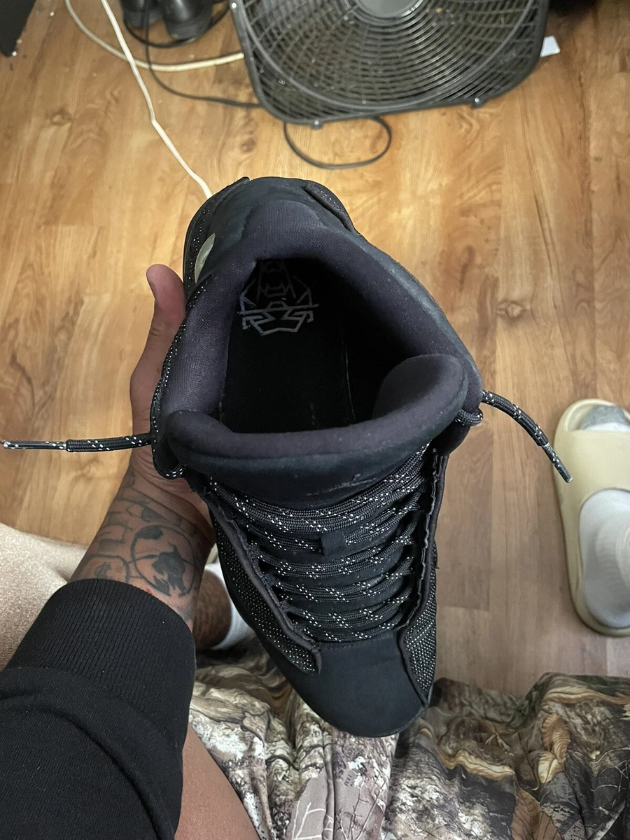 Black cat top 13s on feet