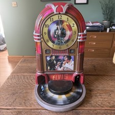 elvis presley rock 'n' roll cuckoo clock by the bradford exchange See desc