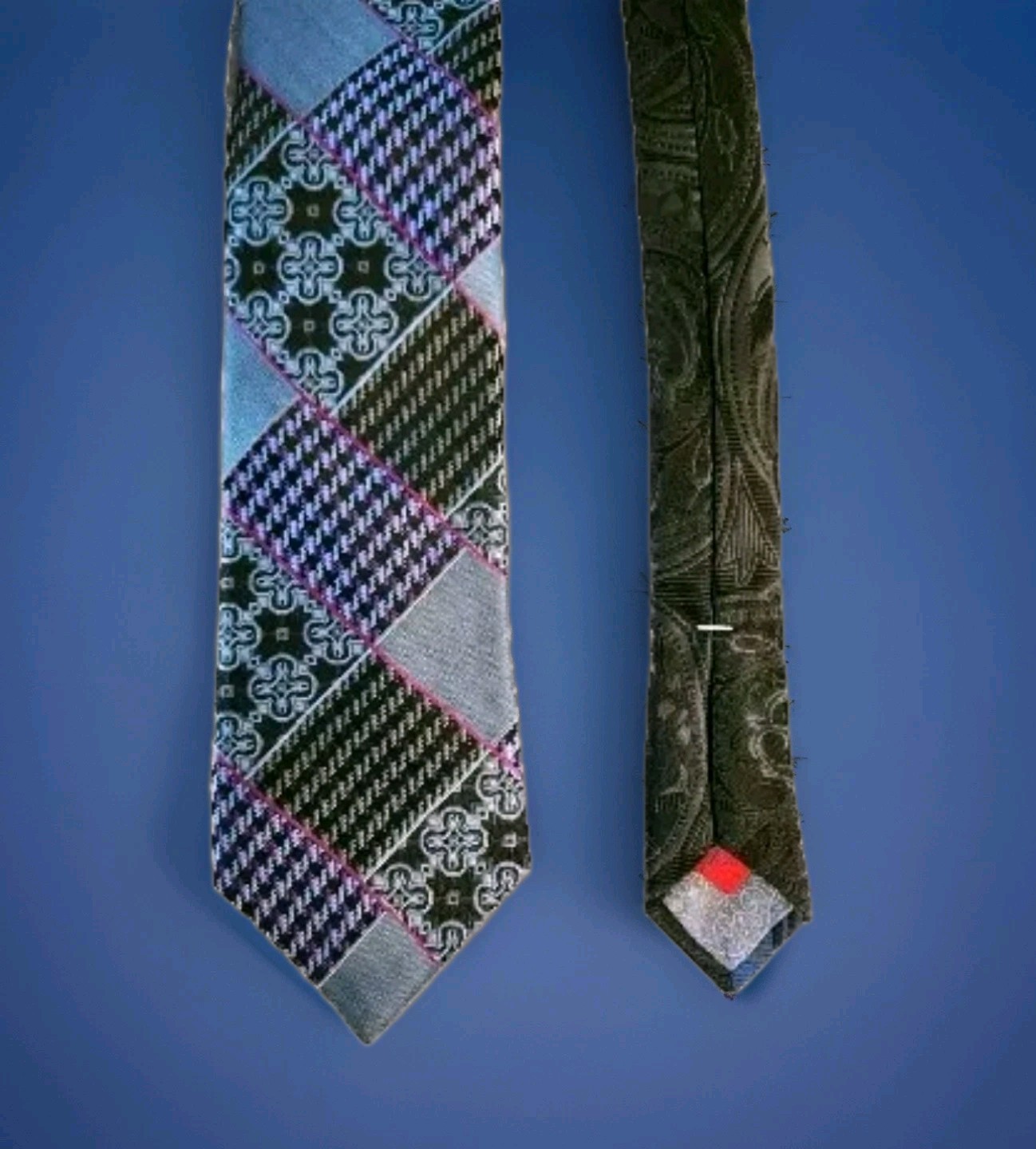 Robert Graham men’s neck tie with multicolor patchwork design, black and white checkered pattern, and red made in USA label.