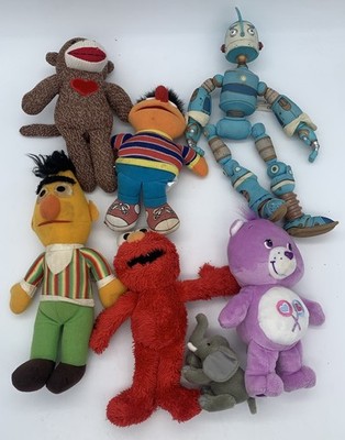 Lot of 7 Character Plush Toys Sock Monkey Sesame Street Care Bear Robots Movie