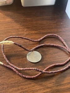 Antique African Brown With Blue And White Stripes Bead Strand