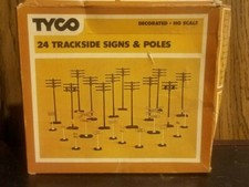 Tyco 24 Trackside Signs Poles vintage w box. missing 1 sign HO scale
