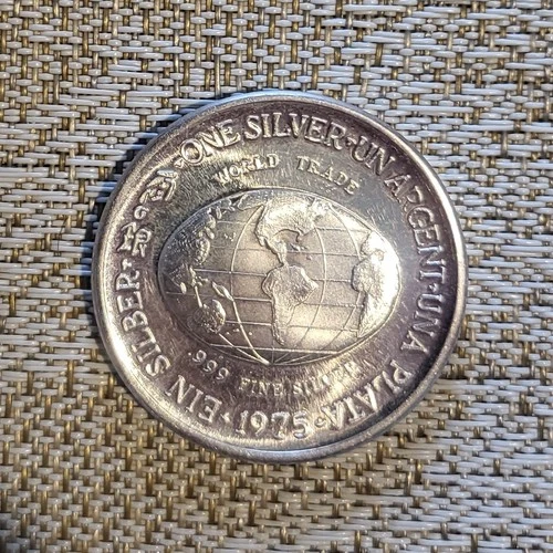 1975 International Silver Trade Unit , 1 oz .999 Fine Silver,  Argent Una Plata