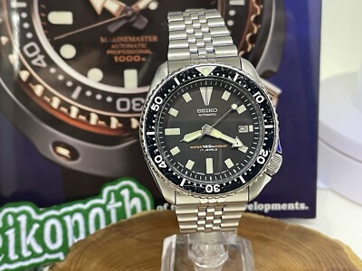 Seiko schwarze Herrenuhr - 7002-7001 Vintage Automatik Taucher neues Armband montiert