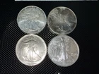 Lot of 4 American Silver Eagles 1 oz .999 Fine Silver – Mixed Dates
