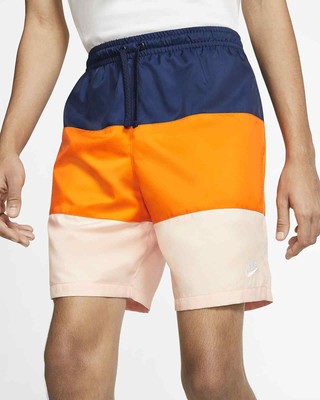 nike swoosh woven shorts orange