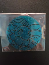 Pokemon Prismatic Evolutions Tin JUMBO Glitter Eevee Coin Teal